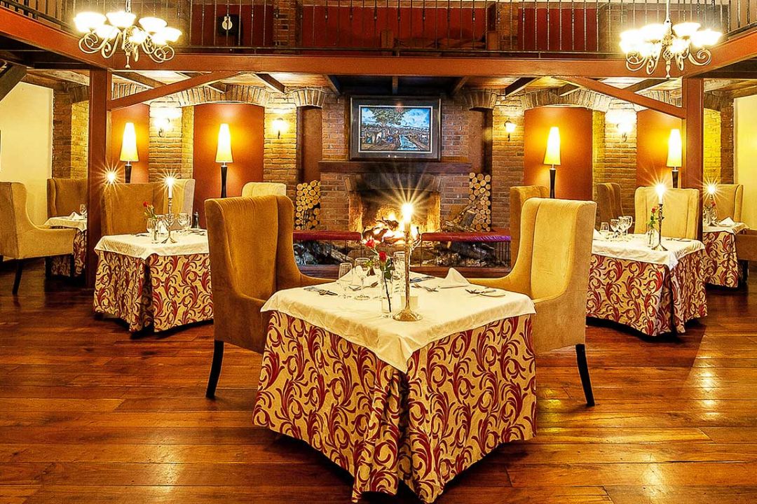 Lodge garden with views of Mount Meru